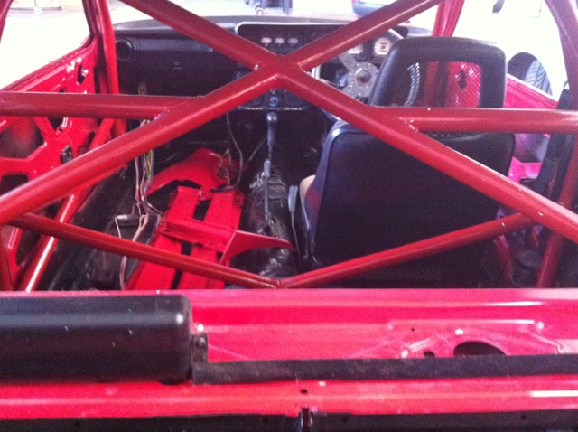 Had roll cage painted color of the car.Floorboar painted black, in time I'll repaint it red.