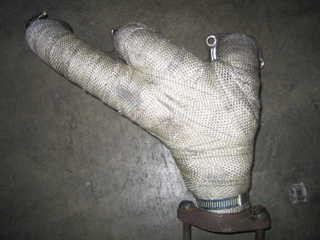 Locally fabbed headers for 24V conversion. Price is around US$450, looks like stainless.