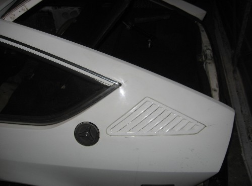 note small cracks in paint and filler at stress points