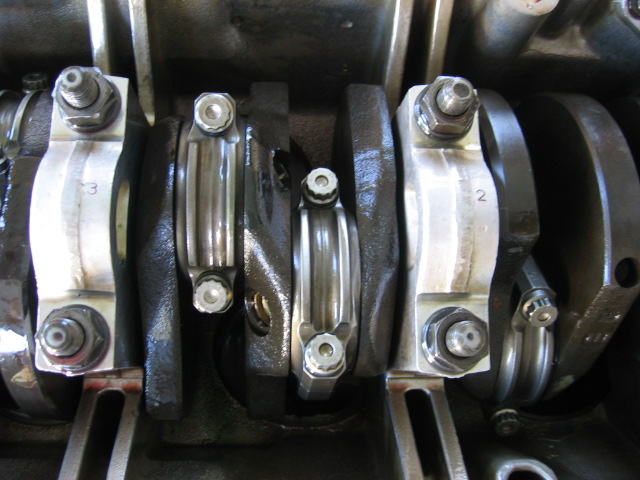 Be sure larger con rod shoulder face oppositely for each cylinder pair (ex: 4 faces front, 1 faces rear)
