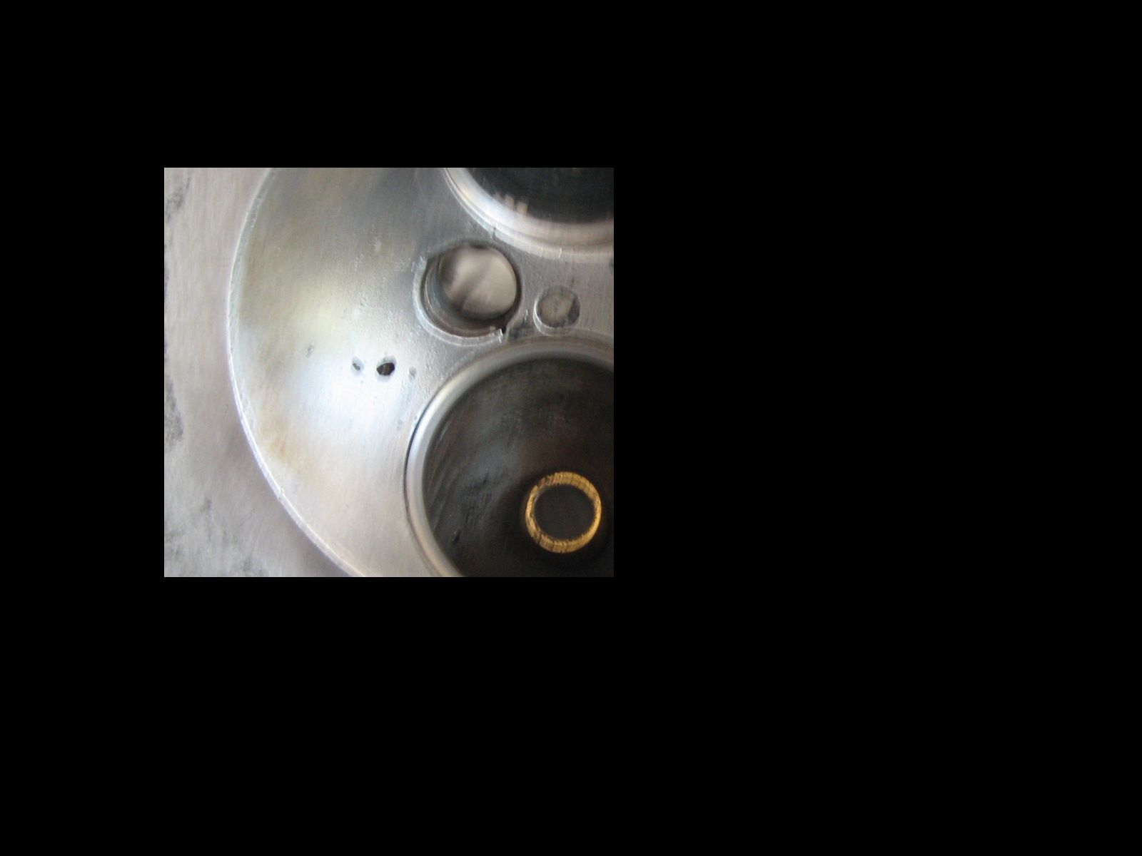 combustion chamber hole.jpg