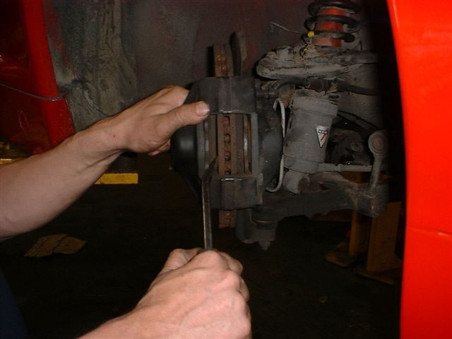 Looks like a HUGE dropped spindle.  The rest of the front suspension looks stock.