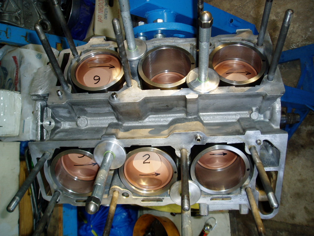 Topside view. Notice the little black dots on top of the liners...it denotes the point of larger bore dimension. Difference can be up to 0.01mm even in NEW liners.