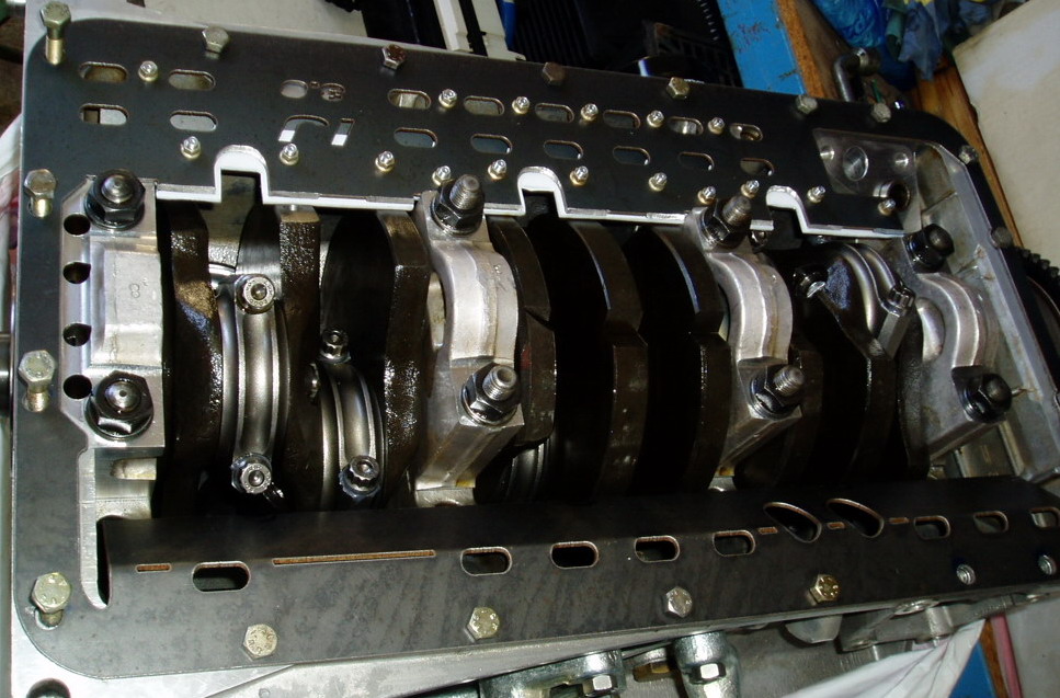 Notice proximity of Teflon sheet to rotating parts.