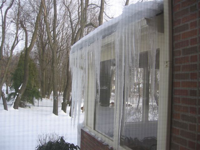 6 inches of ice on the roof...just waiting for my gutters to fall off...