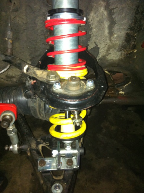 Left side coilover sping, LCA, TCA refitted. Note I've kept the torsion bars, reconsidering taking them off.